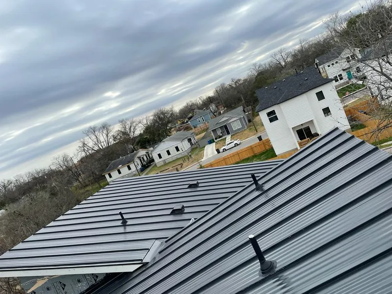 Standing seam metal roof panels with vents for Skylight Repair in Scottdale